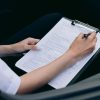 driver documents medical paperwork clipboard CDL truck driver health