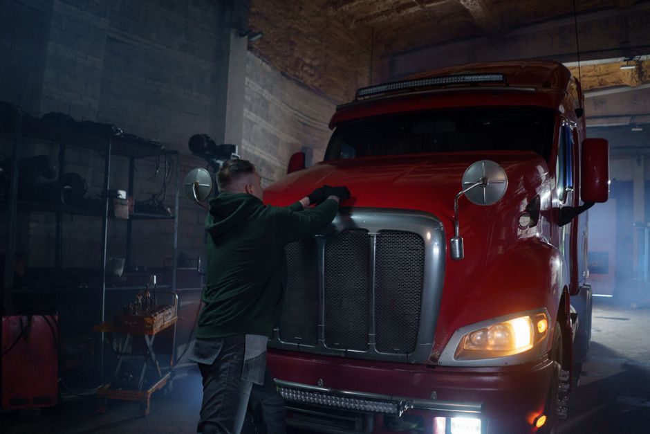 truck driver stretching semi truck CDL truck driver health